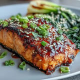 Miso glazed salmon with sesame bok choy, a beautiful amber glaze over flaky fish.