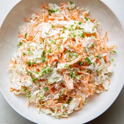 Bright and creamy Coleslaw with Apple, a refreshing side dish with visible apple and carrot.